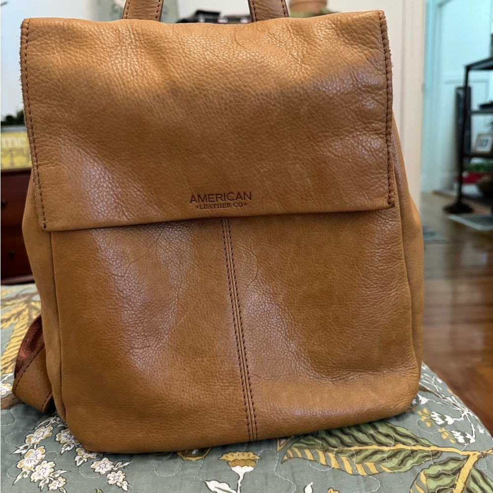 American *leather company* backpack